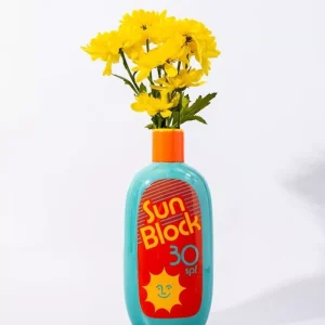 Vase en céramique, crème solaire